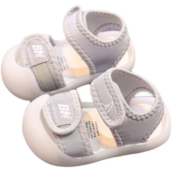 Beebi tekstiilist sandaalid kirjaga