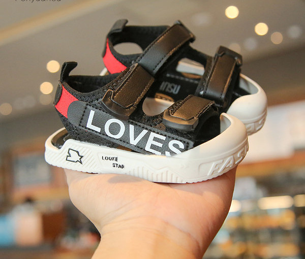 Beebi sandaalid takjapaela ja kirjadega