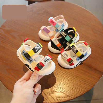 Beebi sandaalid kirja ja lameda tallaga