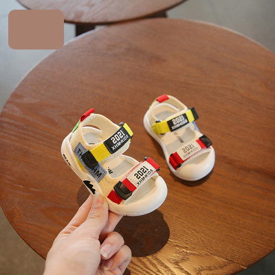 Beebi sandaalid kirja ja lameda tallaga