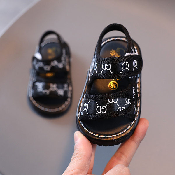 Бебешки сандали с лепенки в бял и черен цвят 