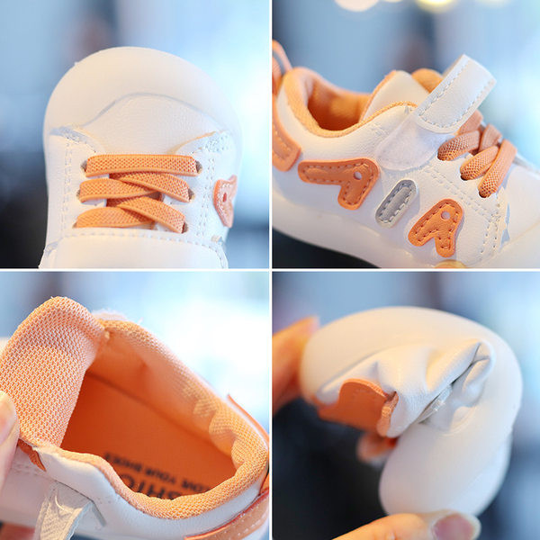 Võrgusilma ja pealdisega beebisandaalid