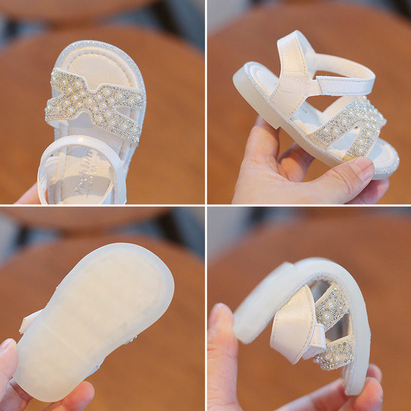 Dekoratiivkivide ja pärlitega beebisandaalid