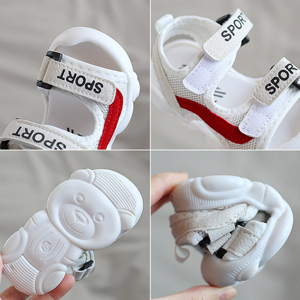 Beebi riidest sandaalid kirjade ja küljeäärtega