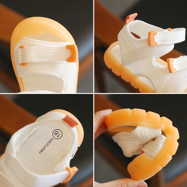 Kolmes värvitoonis kleebistega beebisandaalid