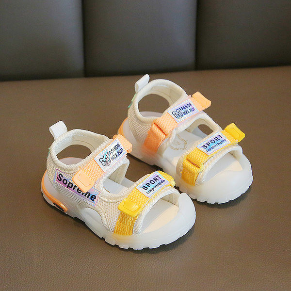 Mitmes värvitoonis kirja ja kleebisega beebisandaalid