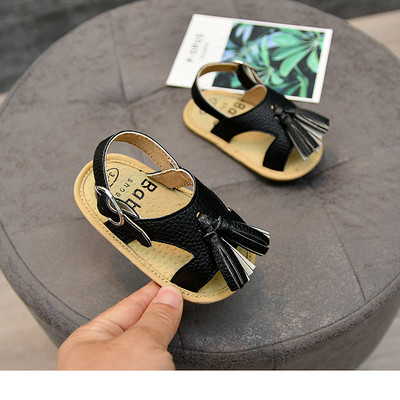 Nahast beebisandaalid tuti ja pandlaga