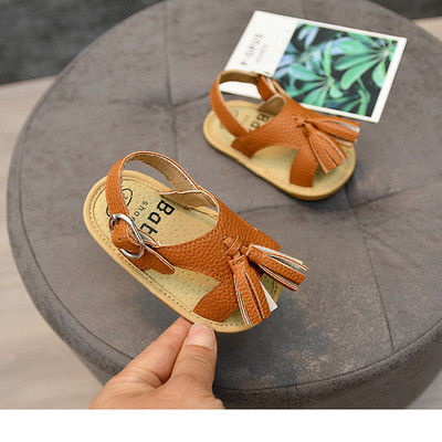 Nahast beebisandaalid tuti ja pandlaga