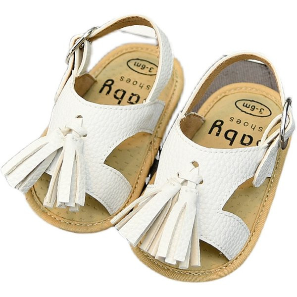 Nahast beebisandaalid tuti ja pandlaga