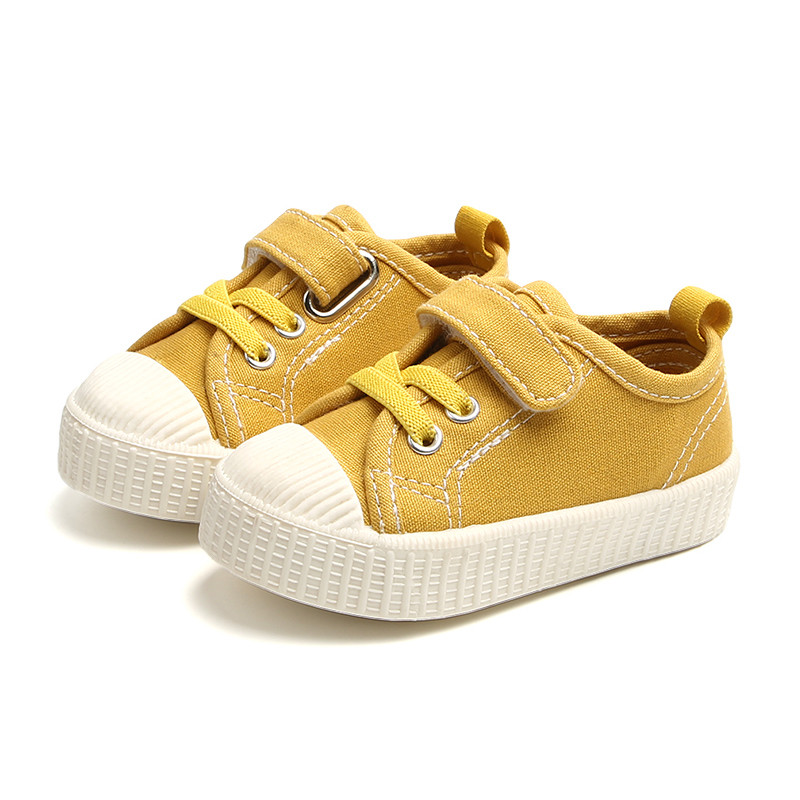 Beebi tekstiilist tossud lipsude ja kleebistega