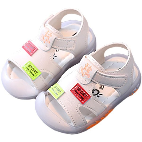 Kahes värvitoonis kleebistega beebinahast sandaalid