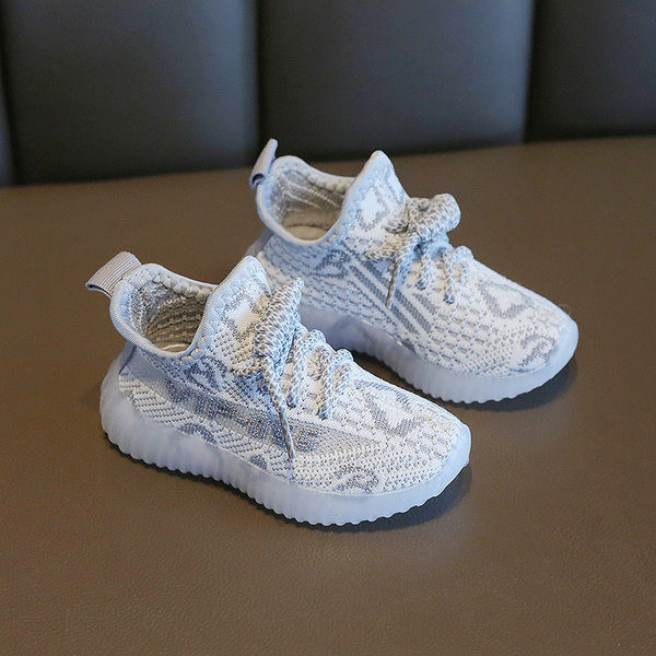 Mitmes värvitoonis paeltega beebitekstiilist tossud