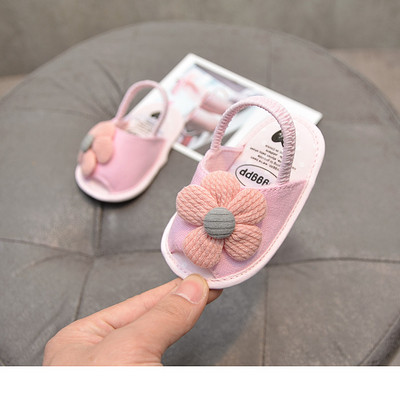 Beebi sandaalid 3D lille ja kummiga