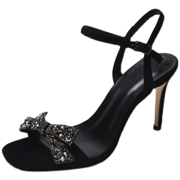 Naiste sandaalid kõrge kontsaga pandla ja kividest paelaga