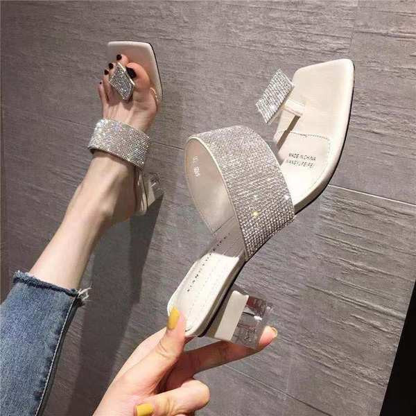 Kõrge kandilise kontsaga ja dekoratiivkividega naiste sussid