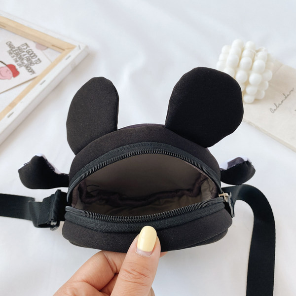 Moodne laste ümmargune õlakott kahes mudelis