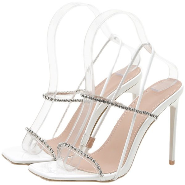 Μοντέρνα γυναικεία σανδάλια με διακοσμητικές πέτρες και λεπτό τακούνι