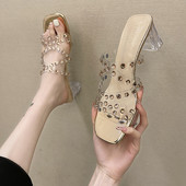 Γυναικείες παντόφλες με διακοσμητικές πέτρες και διαφανή τακούνι σε δύο χρώματα