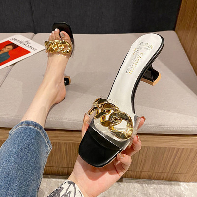 Γυναικείες ψηλοτάκουνες παντόφλες διαφανές μέρος και μεταλλικό στοιχείο