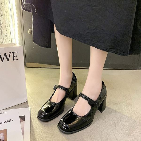 Musta ja pruuni värvi paksu kontsaga naiste nahast kingad