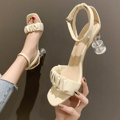 Naiste läbipaistva kontsa ja rihmadega nahast sandaalid