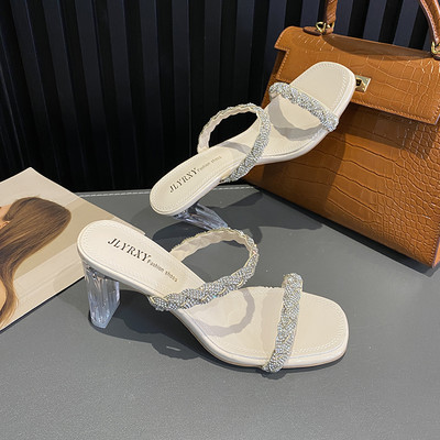 Naiste moodsad läbipaistva kontsa ja kivikestega sussid