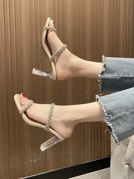 Naiste moodsad läbipaistva kontsa ja kivikestega sussid