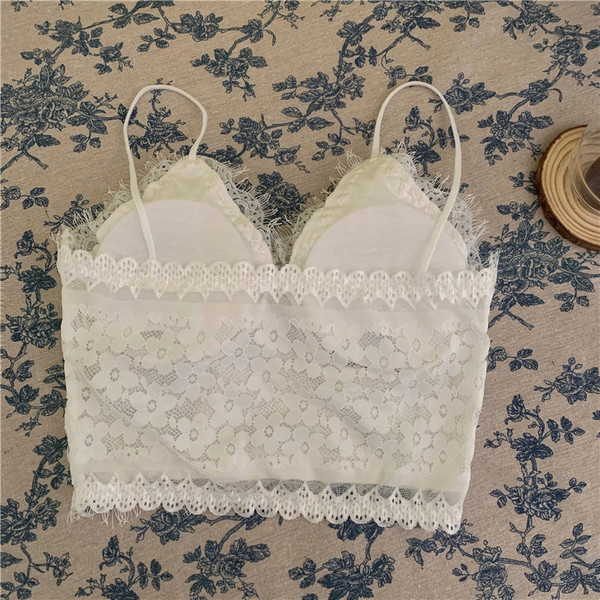 Naiste kaasaegne lühike valge ja must õhukeste rihmadega topp