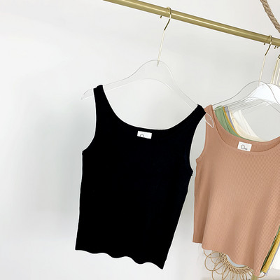 Μοντέρνα γυναικεία αμάνικη μπλούζα με στρογγυλή λαιμόκοψη και φαρδιά τιραντάκια