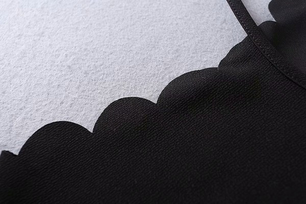 Lühike naiste topp õhukesest kudumisest lukuga