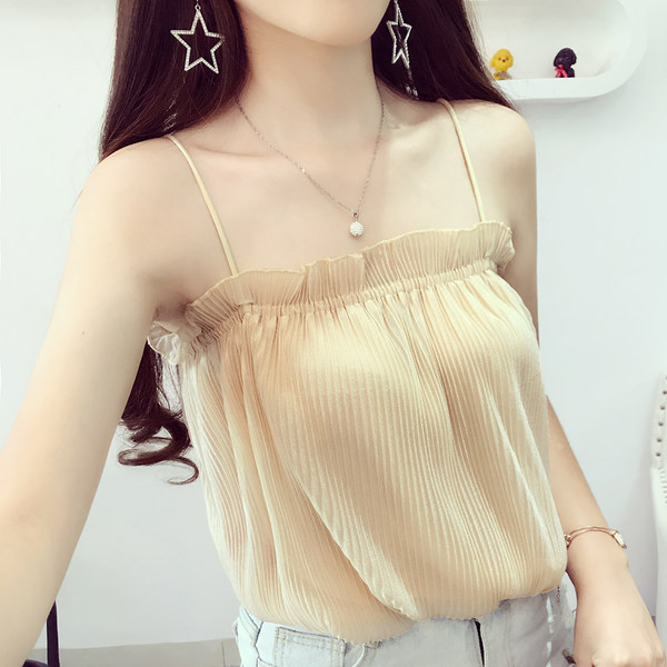 Moodne peenikeste rihmade ja lokkidega naiste topp