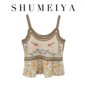 Tikandite ja lillemustriga naiste topp