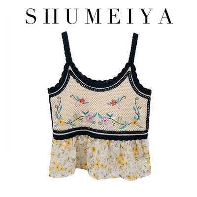 Tikandite ja lillemustriga naiste topp