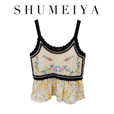 Tikandite ja lillemustriga naiste topp