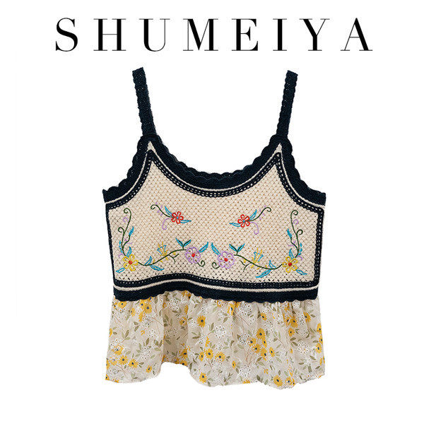 Tikandite ja lillemustriga naiste topp