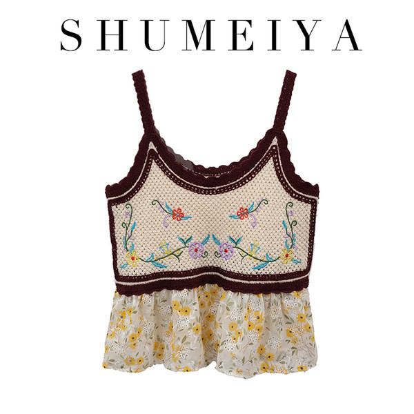 Tikandite ja lillemustriga naiste topp