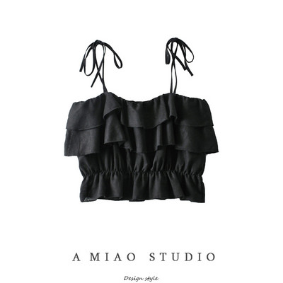 Naiste lühike õhukeste rihmade ja lokkidega topp