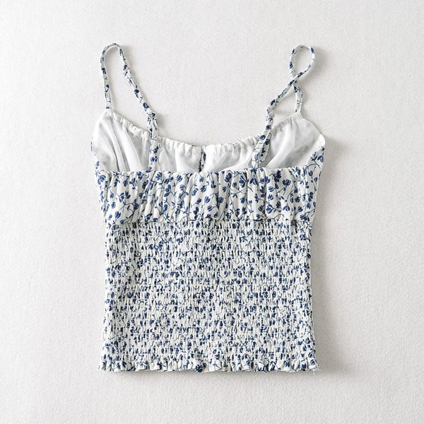 Naiste lipsude ja lillemotiividega topp