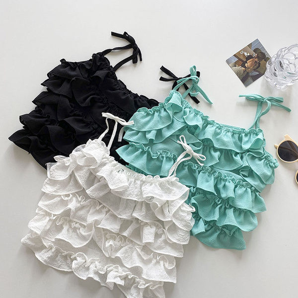 Μοντέρνα γυναικεία αμάνικη μπλούζα με βολάν  και λεπτά τιραντάκια