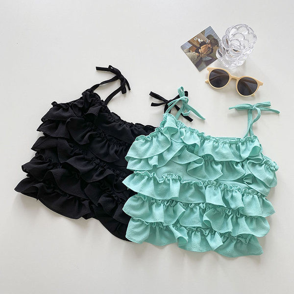 Μοντέρνα γυναικεία αμάνικη μπλούζα με βολάν  και λεπτά τιραντάκια