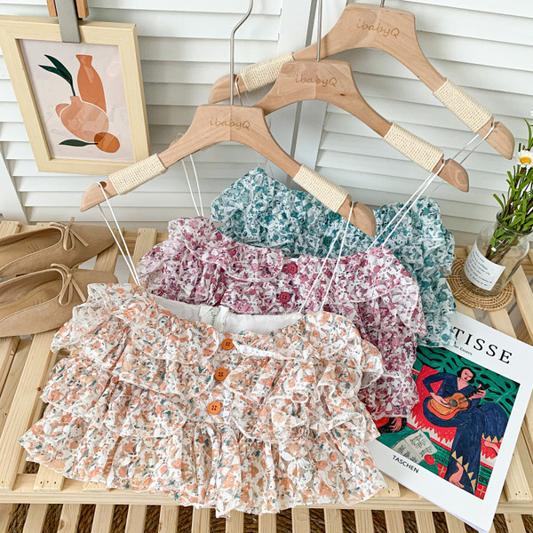 Μοντέρνο γυναικείο βολάν με κουμπιά και βολάν