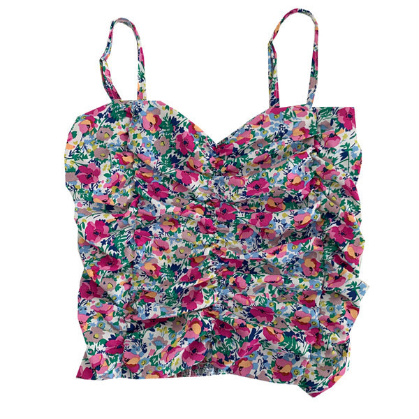 Lillemotiivide ja õhukeste rihmadega moodne naiste topp