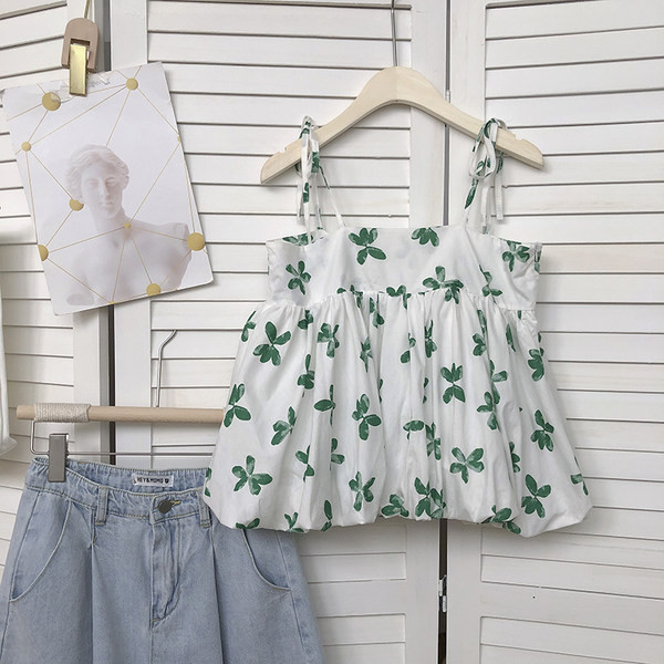 Γυναικεία φαρδιά αμάνικη  μπλούζα με λεπτούς ιμάντες και λουλούδια μοτίβα