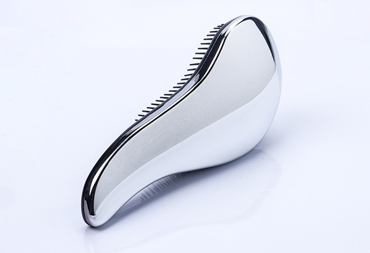 Μικρή χτένα μασάζ σε τέσσερα χρώματα