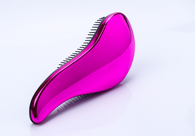 Μικρή χτένα μασάζ σε τέσσερα χρώματα