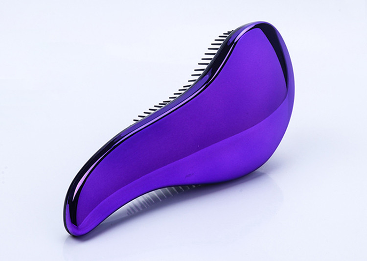 Μικρή χτένα μασάζ σε τέσσερα χρώματα