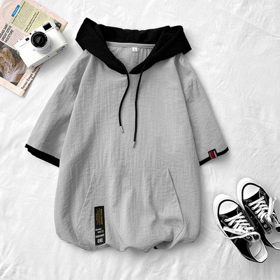 Laia mudeli vabaaja pluus tasku ja kapuutsiga