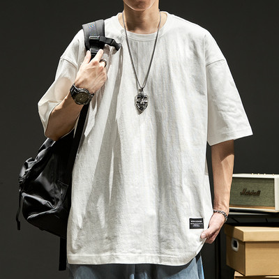 Φαρδύ μπλουζάκι με οβάλ λαιμόκοψη και έμβλημα