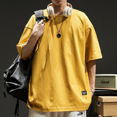 Φαρδύ μπλουζάκι με οβάλ λαιμόκοψη και έμβλημα