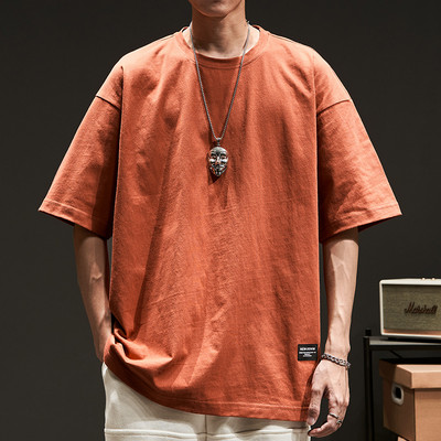 Φαρδύ μπλουζάκι με οβάλ λαιμόκοψη και έμβλημα